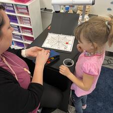 Student and teacher numeracy lesson